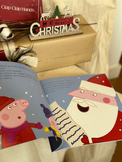 Peppa Visits Santa [Book]